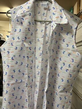 Sleeveless White Button-Up Shirt with Blue Sailboat Print